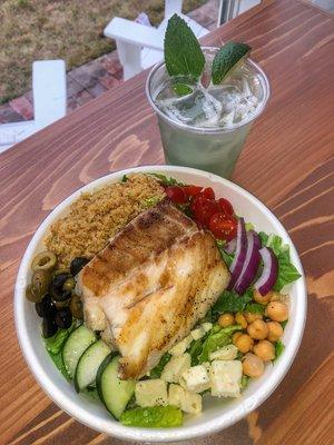 Mediterranean salad w/ fresh blackened grouper and a cucumber refresher !  New Years resolutions