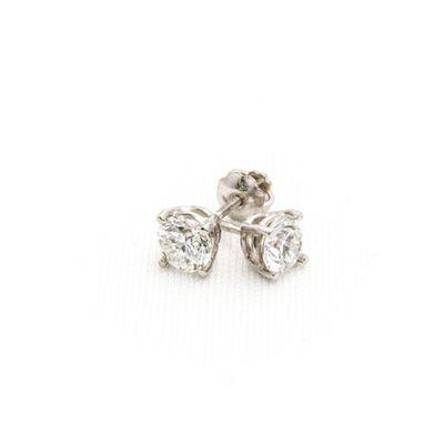 Diamond Stud Earrings by Pierre.