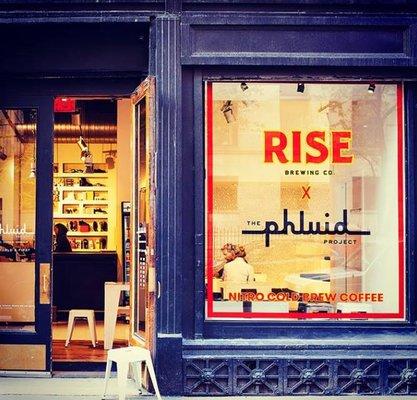 Windows of RISE Coffee - Nitro Cold Brew Coffee in New York City - Located inside The Phluid Project store