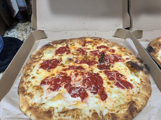 Cheese pizza, may look like pepperoni but those are fresh tomatoes!