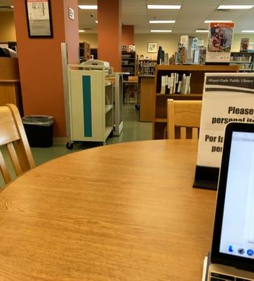 Library interior: desks, computers, books