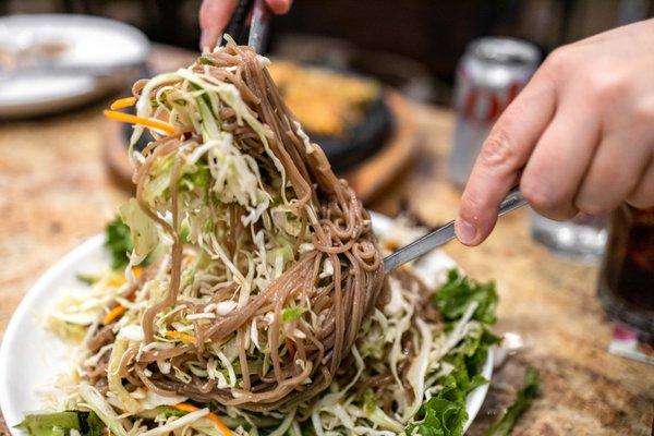 DotoleeYachae Guksoo ($21)
 Acorn noodles tossed w/ vegetables & soy sauce dressing