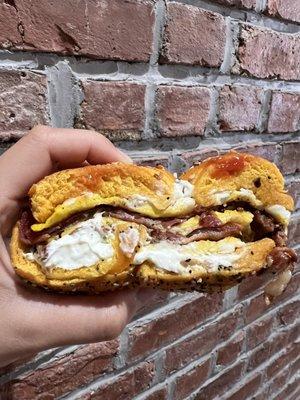 Bacon egg cream cheese on egg everything bagel