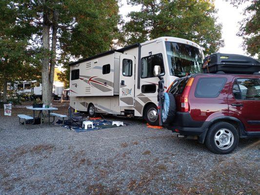 This is our RV with our tow car, a 2003 Honda CRV with over 213,000 miles and still runs great.