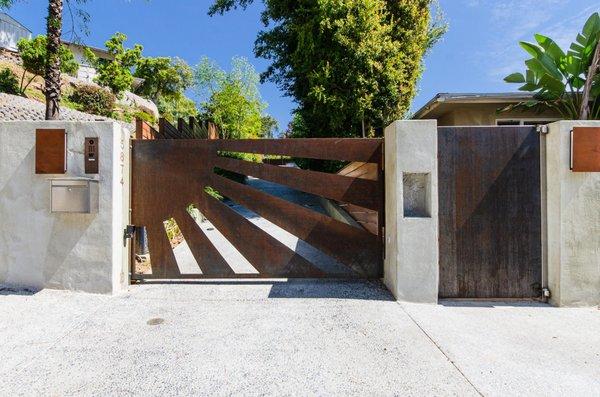 Corten steel swing driveway gate in Hollywood Hills