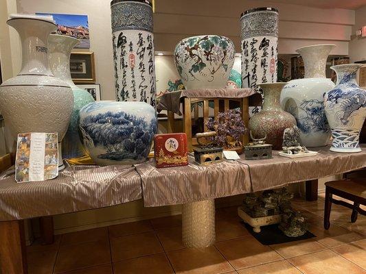 Chinese pots. Old cookie tins and antiques for sale in the restaurant.