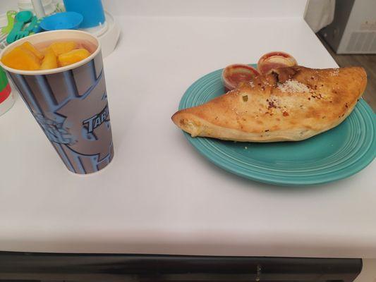 Calzone with broccoli, spinach, bellpeppers and onions. And Tarheels basketball!!