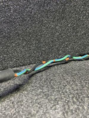 Kreative braided and cut the wires to spec and used nice tape. It's the small details...