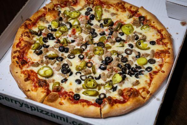 Large Pizza with jalapeños olives and sausage