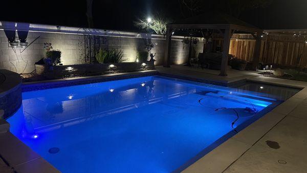 Pool with the accent lighting provided by AJS Sprinkler Inc.