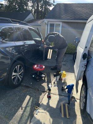 Chris working on my Subaru