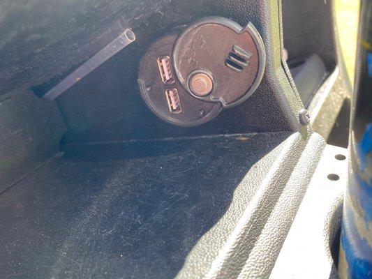 USB ports in the golf buggies!  I don't know who left that nasty straw in there, I was not going to touch it.