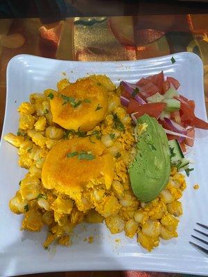 Hominy with scrambled eggs and potato cakes