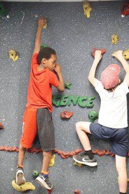 Climbing on the rockwall.