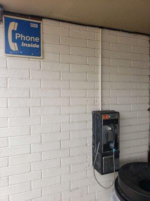 There is a payphone outside. We didn't check to see if it still worked.