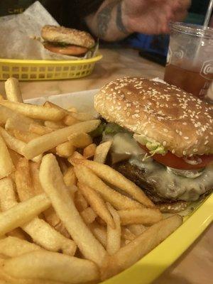 Mushroom and Swiss burger with fries