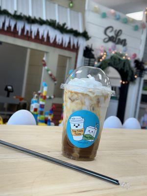 Caramel iced latte 
(Our Tiny Town decorated for Christmas in the background)