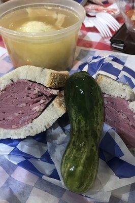 Staples in my life; pickle and matzo ball soup with a side of corn beef!