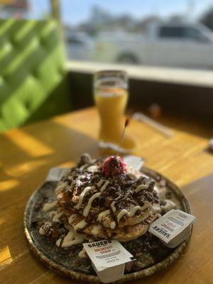 Peanut butter and chocolate pancakes with fresh orange juice