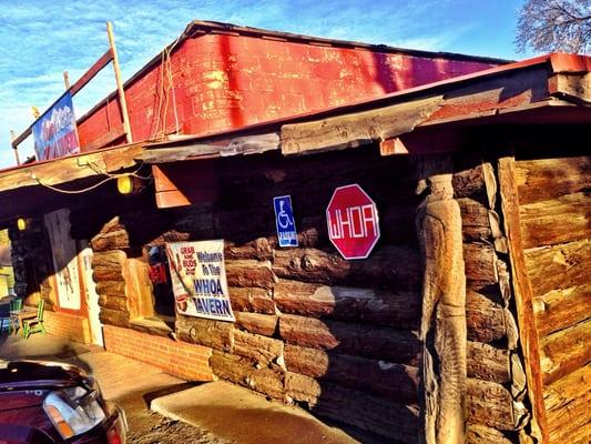 Check out the reclaimed log siding...and the Whoa stop sign!