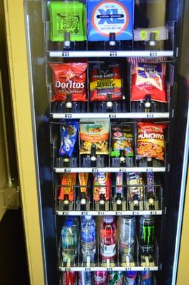 Vending machine with musician essentials, strings, picks, earplugs and 9 volt batteries.