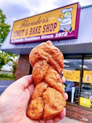 A muzzie. wtf is a muzzie?? U ask... Cinnamon roll dough with raisins, loosely braided and made like a glazed stick donut.