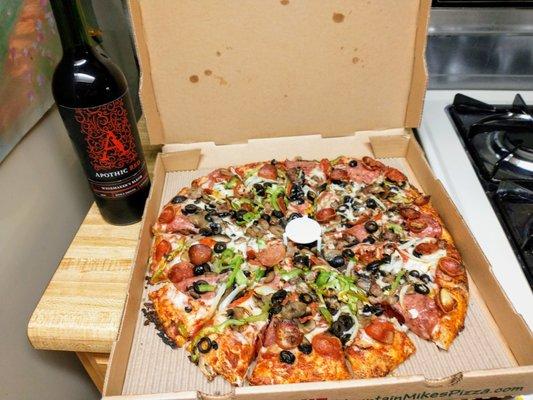 Combo pizza and red wine, YUM!