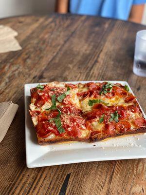 Detroit style pepperoni with red Chile flakes and basil.  Bon appetit!!