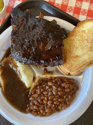 Ribs, pulled pork, beans and mashed