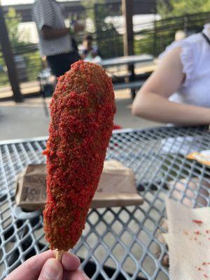 Korean corn dog with flaming hot Cheeto