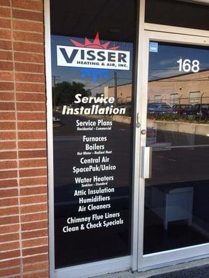 The front door of our office in Elmhurst, IL along with some of the services that we offer.