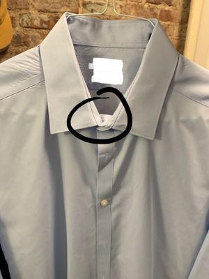 The collar is bent over and practically ironed down. With a tie this looks only bearable. Open collar it looks bad.