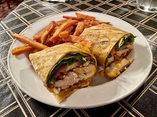 "Buffalo Chicken Wrap" (tomato tortilla, grilled chicken, buffalo sauce, gorgonzola crumbles, lettuce, tomato) with Sweet Potato Fries