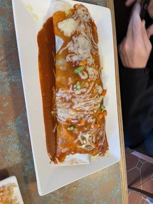 Gigantic and delicious burrito!!!This burrito has a good mix of veggies, soft grilled chicken breast and refried beans.