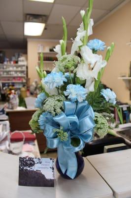 $40 bouquet - includes glass vase and blue ribbon and many flowers