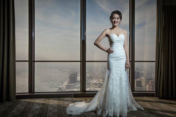 Bride suing wearing a made-to-measure gown