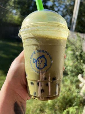 Matcha green tea with boba pearls