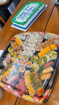 Commissary has sushi platters and customizable cakes. You do have to order in advance.