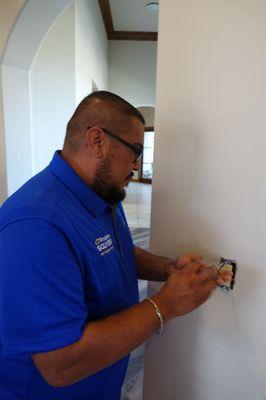 Our Master Electrician Jason checking some switches.