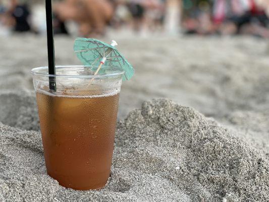 This is the tropical itch drink reclining on Waikiki Beach