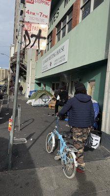 Homeless encampment, trash and human feces