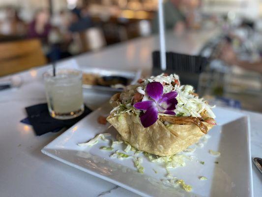 Tostado salad and a glass of tequila.