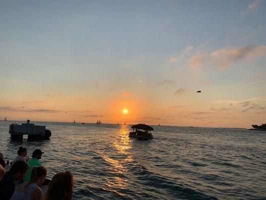 We are our Conch Fritters while watching the Sunset at Mallory Square