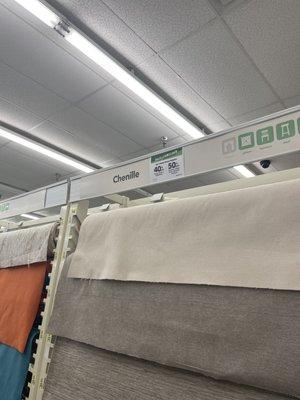 Every bank of home dec fabric had a sale sign as shown.