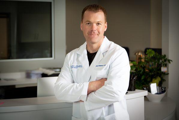 J. Alex Kelamis, MD is a Tulsa native who trained at OU and completed his residency at  Johns Hopkins and the University of Maryland.