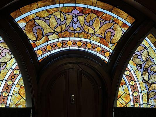 The stained glass window above the stairway to the bedrooms on the 2nd floor.