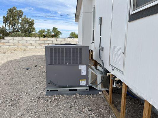 Bryant 2-stage package heat pump on new modular home build with all new duct work system design.