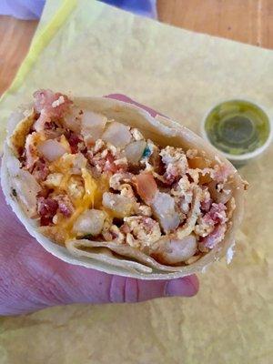 Tomato and onion burrito add bacon. Delicious!