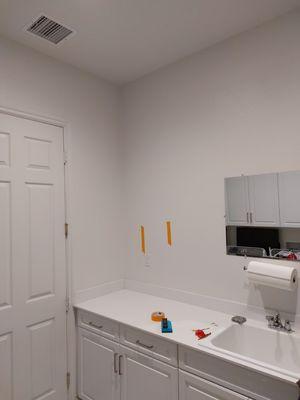 Laundry room cabinet install.