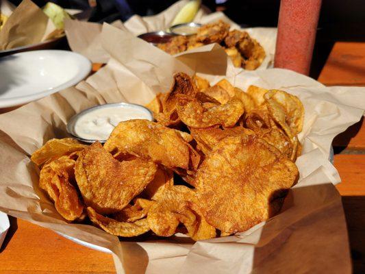 Homemade chips with blue cheese fondue